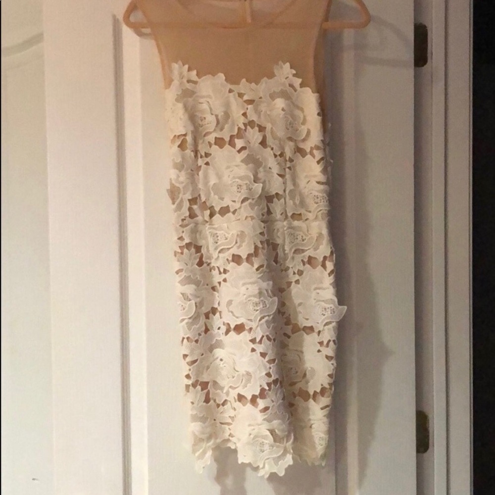 An elegant white dress in excellent condition